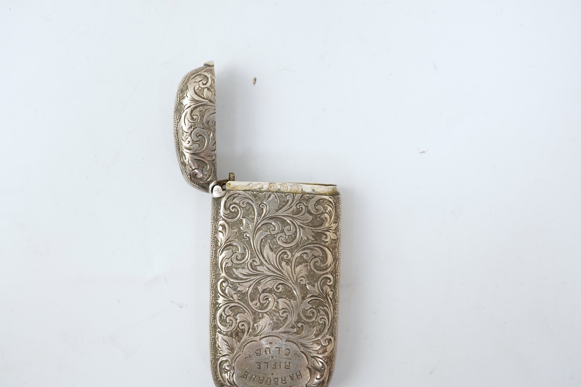 A late Victorian engraved silver oval combination sovereign and vesta case, by JW